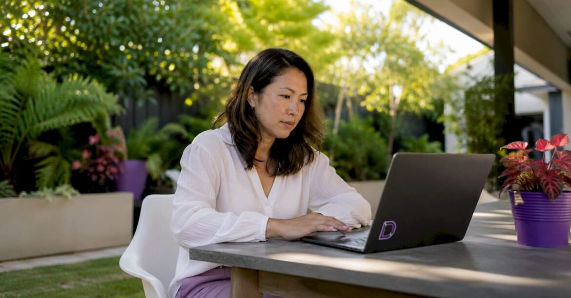 Woman setting up private domain registration at home