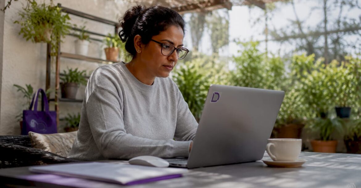 Person performing email migration at home office